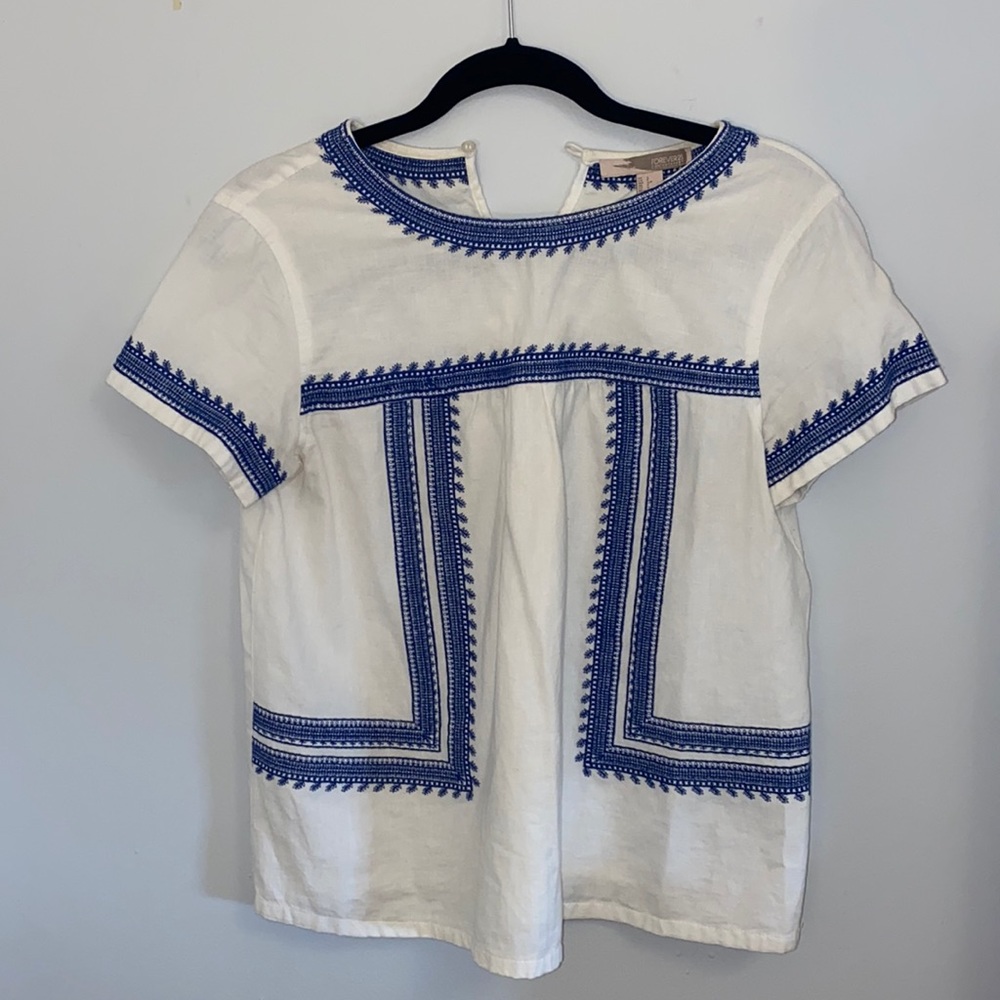 Blue and white embroidered blouse
